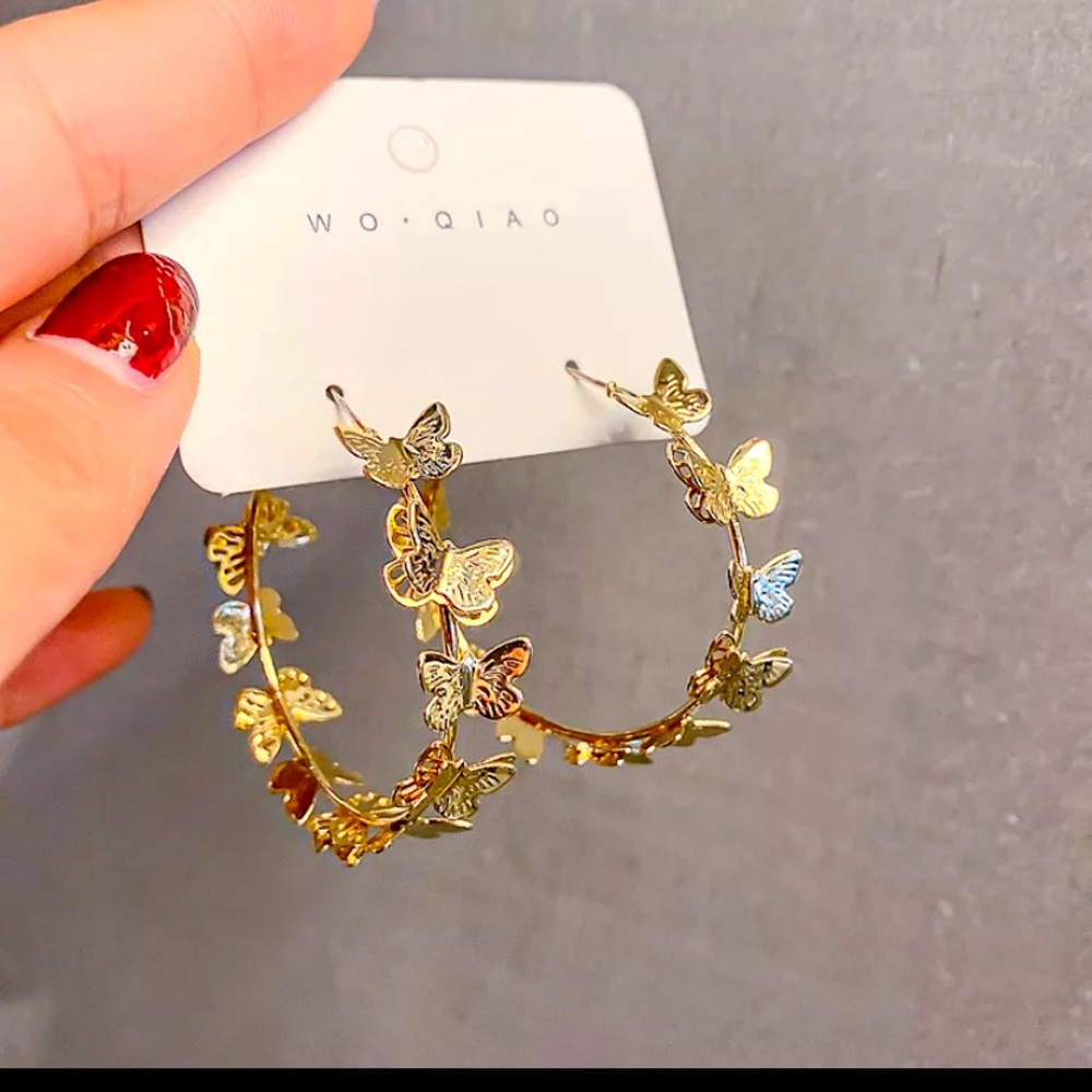 Trendy gold butterfly hoop earrings